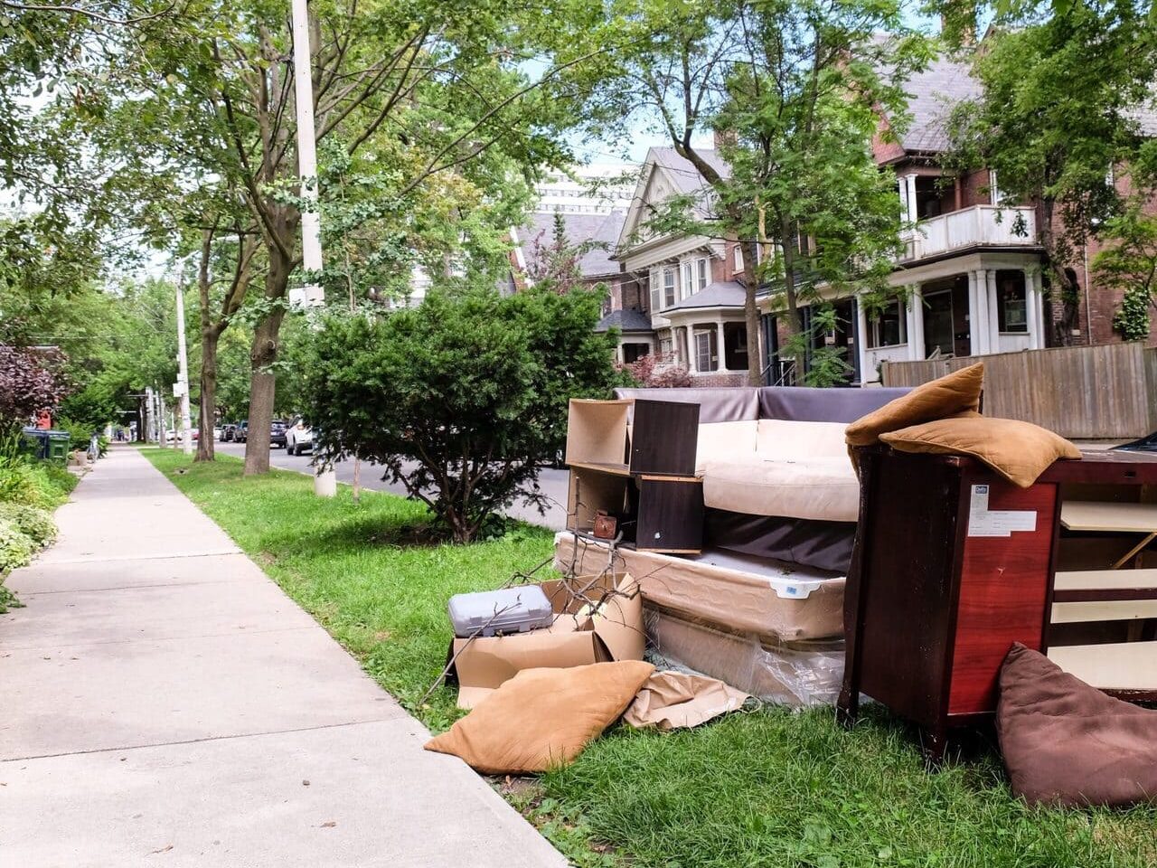 furniture-waiting-for-recycling-on-the-sidewalk-2024-05-27-02-54-11-utc-scaled